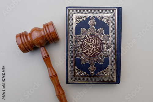Top View of Wooden Gavel and Holy Quran Book Representing Sharia Law and Justice