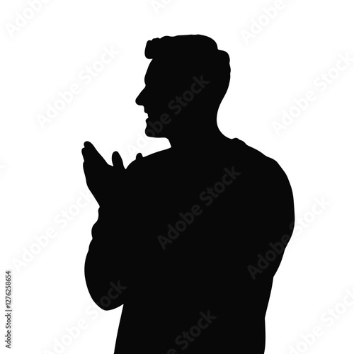 Caucasian man applauding in silhouette, expressing joy and recognition
