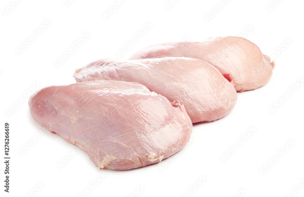 Three raw turkey breasts isolated on white Three raw turkey breasts isolated on white