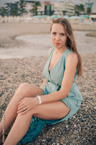 Woman in Flowing Dress on S...