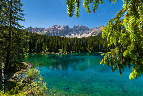 Fényképezés Karersee lake in the Dolomites, South Tyrol, Italy, also known as lake Carezza