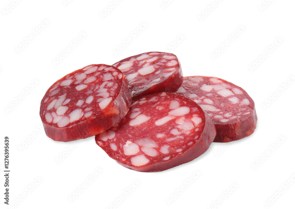 Pieces of delicious dry cured sausage isolated on white Pieces of delicious dry cured sausage isolated on white