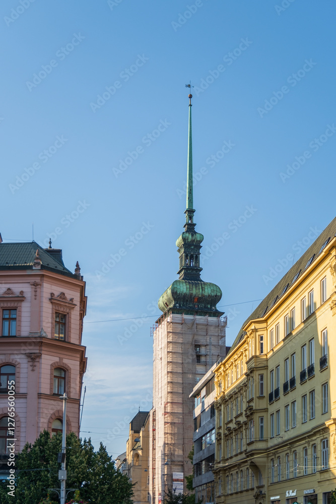 Naklejka premium Slender church tower with green patina spire