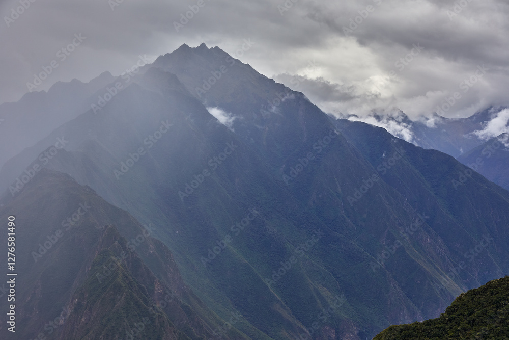 Fototapeta premium Choquequirao’s rugged terrain tests the spirit of adventure with every step. Carved by time and nature, these dramatic Andean slopes lead to one of Peru’s most awe-inspiring hidden treasures.
