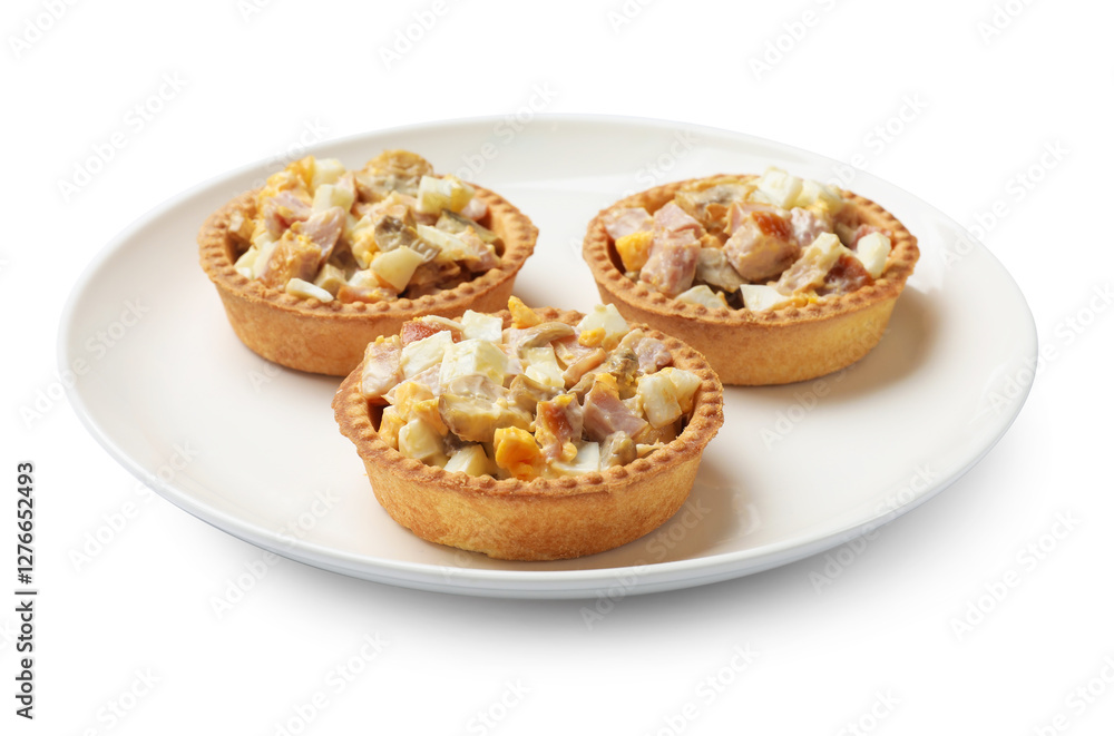 Tartlets with delicious filling isolated on white Tartlets with delicious filling isolated on white