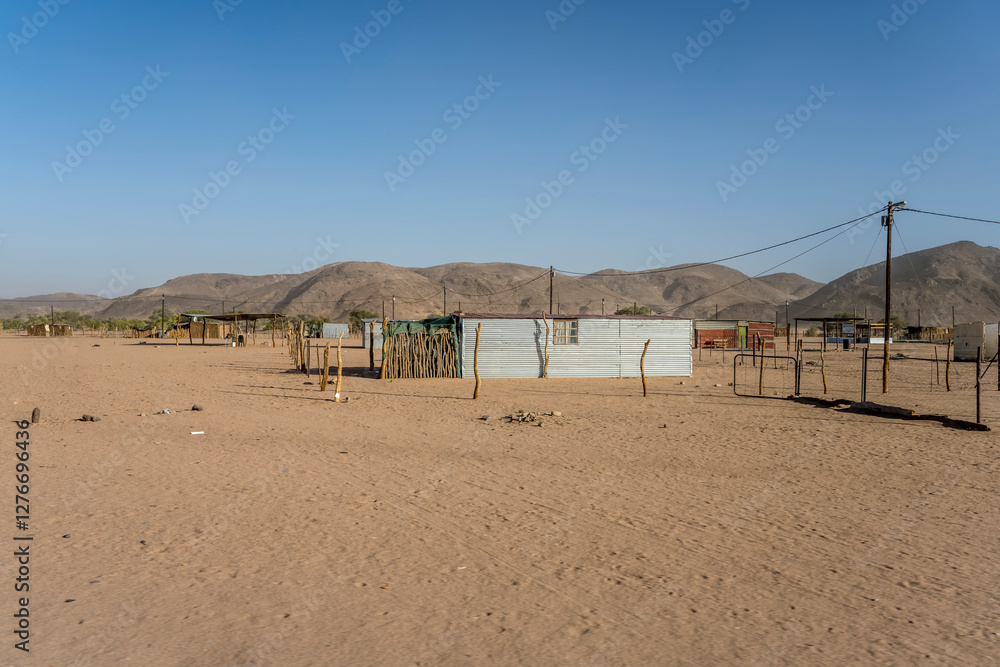 fences and shacks in desert village, De Riet, Namibia