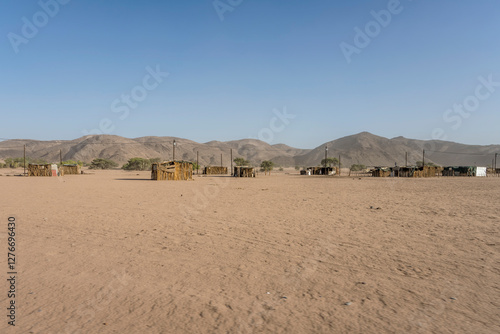 Obraz na płótnie woodden shacks in desert village, De Riet, Namibia w salonie
