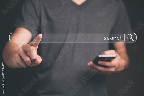 Data Search Technology, Search Engine Optimization. Man's hands use smartphone and touching on search bar to searching for data information. Using Search Console with your website photo