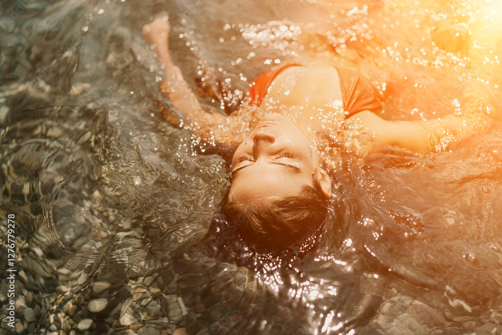 Fototapeta premium Happy woman sea relaxing floating in transparent sea water on summer holiday. Travel leisure recreation lifestyle, female in nature.