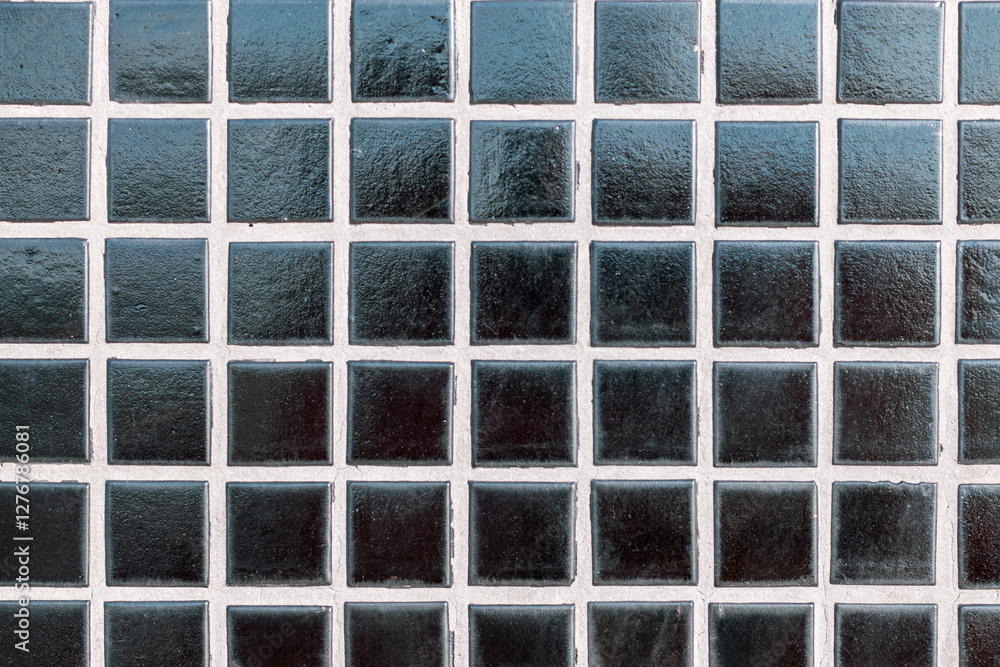 background of black ceramic tiles on the wall background of black ceramic tiles on the wall