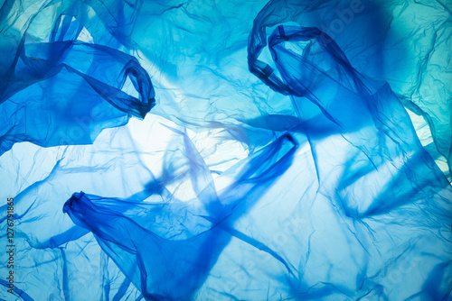 Картината върху платно plastic waste and environmental pollution background: jumbled up blue disposable