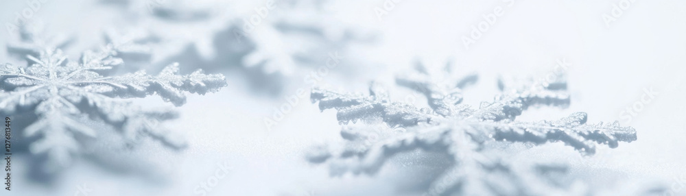 Delicate snowflakes on soft white background evoke winter beauty Delicate snowflakes on soft white background evoke winter beauty