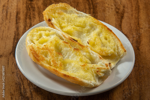bread with butter on the grill, traditional breakfast in Brazil