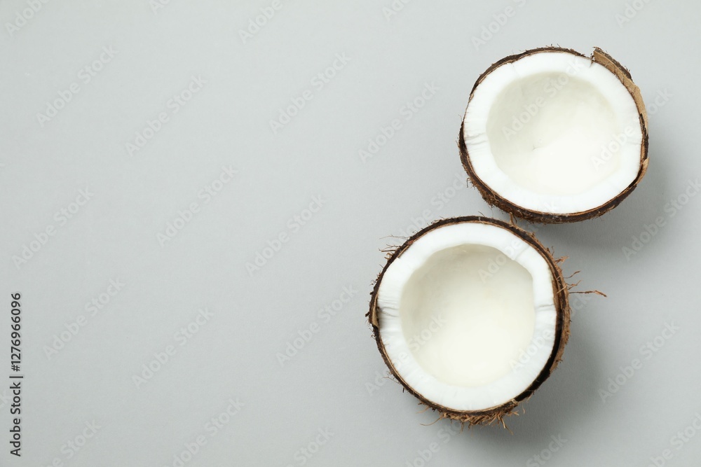 Coconut on gray background, top view Coconut on gray background, top view