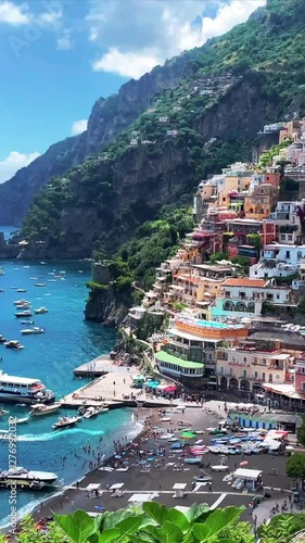 Positano, tourist destination on the Amalfi Coast, Italy. Aerial view of the famous tourist resort of the Amalfi coast. green juicy flora, Positano is a village in Naples metropolitan area. 
