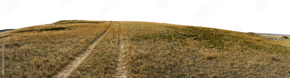 Rugged ranch wagon trail running up a dry desert badlands hill in a park. Transparent sky.
Rugged ranch wagon trail running up a dry desert badlands hill in a park. Transparent sky.