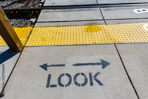 Warning on Sidewalk at The Historic Santa Fe Railyard District, Santa Fe, New Mexico, USA photo