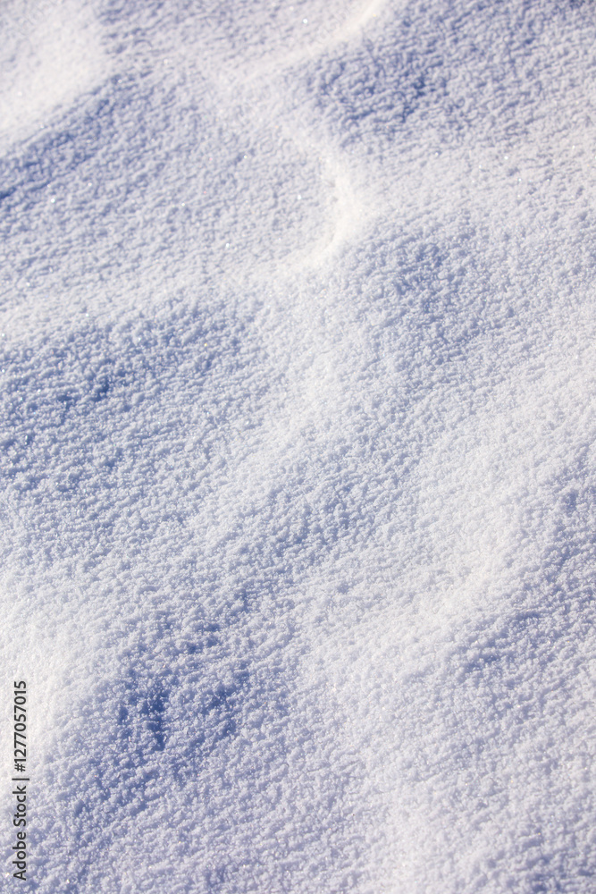 Obraz premium View of natural snow texture in winter in mountains.