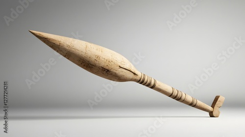 photographic image showcasing a whaling harpoon an iconic tool used in the traditional practice of whaling displayed as a historical artifact in a museum or exhibition setting