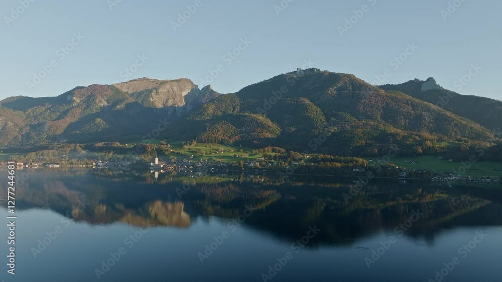 Charming Villages Along A Tranquil Lake With Lush Mountain Backdrop Charming Villages Along A Tranquil Lake With Lush Mountain Backdrop