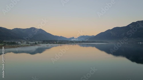 Wallpaper Mural Serene Mountain Silhouettes Reflected On Foggy Lake Wolfgang At Sunrise Torontodigital.ca