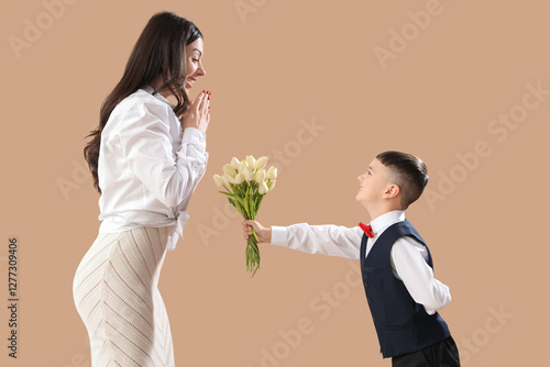 Cute little boy greeting hi...