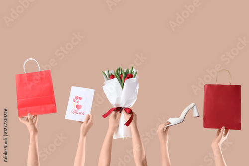 Female hands with bouquet o...