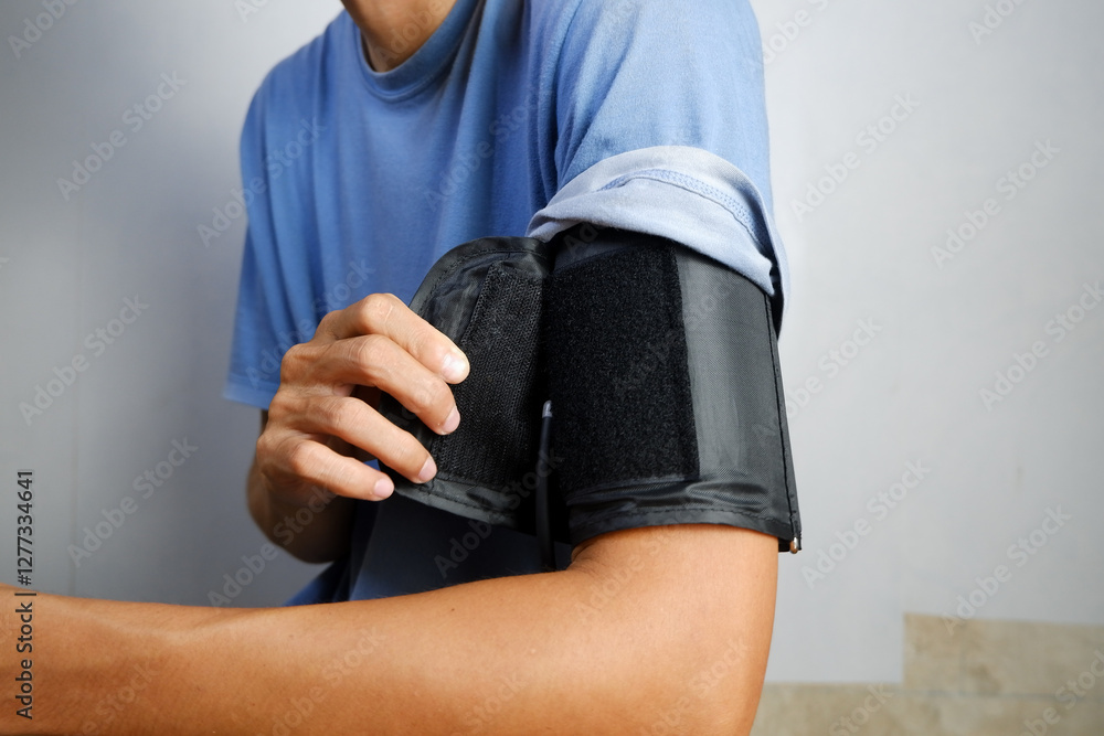 Fototapeta premium Measuring Blood Pressure with a Sphygmomanometer