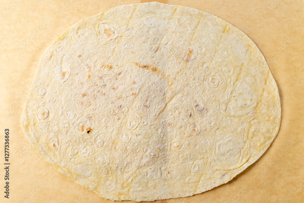 Making tortillas in a traditional kitchen setting Making tortillas in a traditional kitchen setting