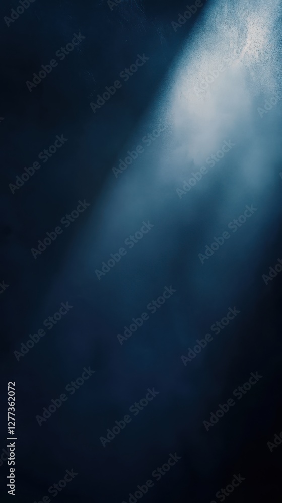 Obraz premium Midnight blue background with smooth texture and blurred white spotlight