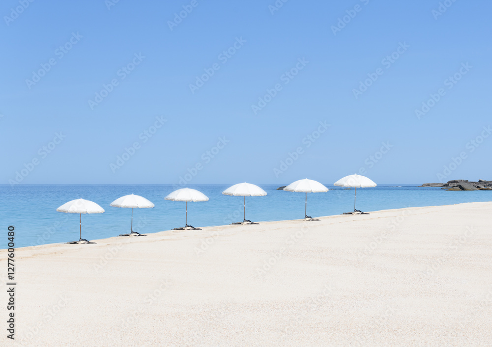 Fototapeta premium A day to swim and relax under the umbrellas
