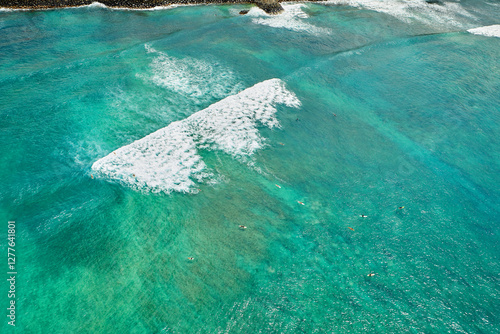 tiny surfers in waikiki
