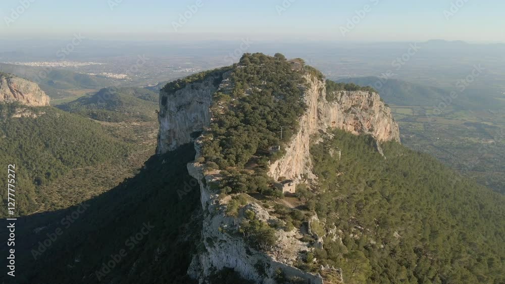 Experience the stunning views of the Tramontana mountain range in Mallorca, showcasing the beauty of Cap Formentor and the historic Castell de Alaro surrounded by nature. Experience the stunning views of the Tramontana mountain range in Mallorca, showcasing the beauty of Cap Formentor and the historic Castell de Alaro surrounded by nature.