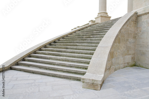 Gray stone staircase with columns and wall