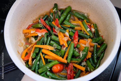 Photography Indonesian homemade food tumis kacang panjang wortel  or sauteed long beans and carrots, top view