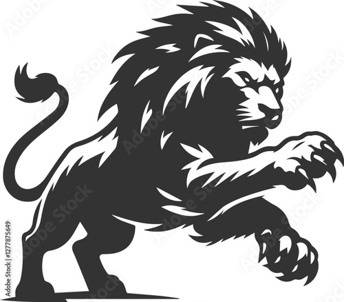 Silhouette of a lion swiping its paw aggressively 