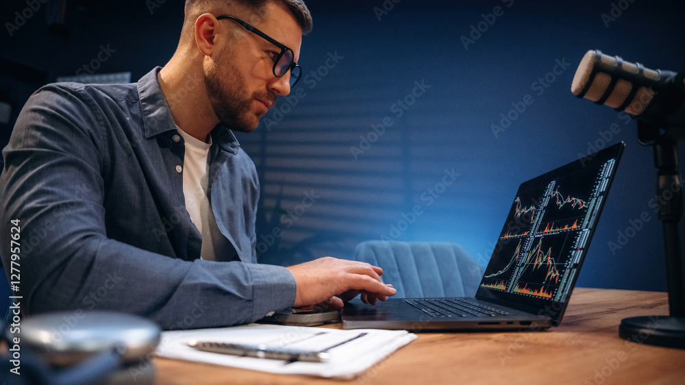 Trading expert is analyzing data. Man with microphone in the studio, conception of podcast Trading expert is analyzing data. Man with microphone in the studio, conception of podcast