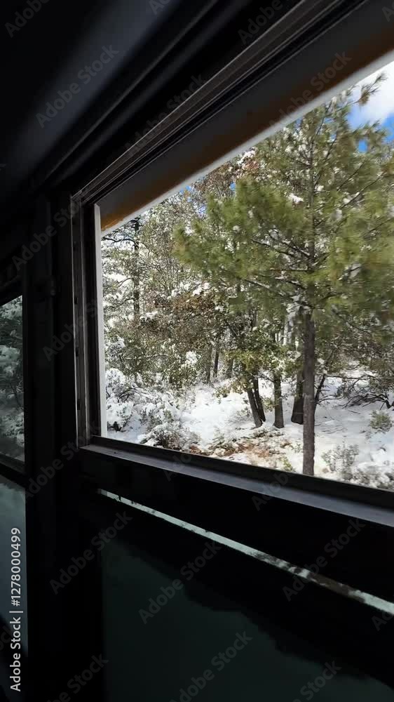 View of beautiful snowy landscape from the window of train View of beautiful snowy landscape from the window of train