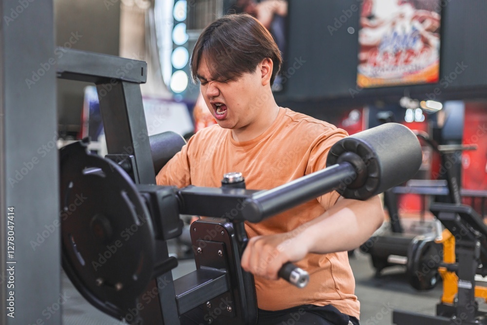 Overweight man struggles with exercise equipment in gym exhausted yet determined Overweight man struggles with exercise equipment in gym exhausted yet determined