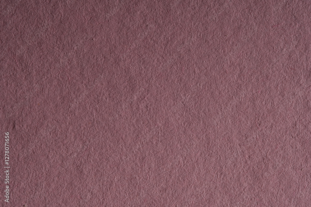 Fototapeta premium Macro close-up of dark mauve paper texture filling the frame
