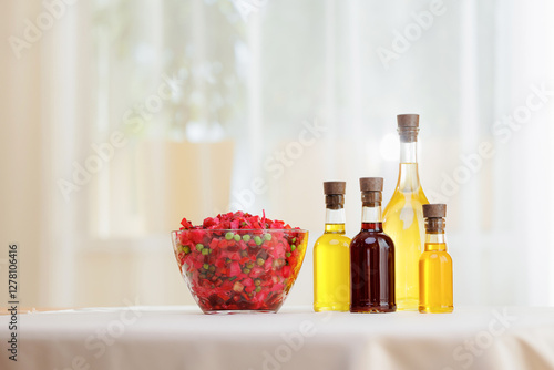 Photography Extra virgin set oil of sunflower, olive in glass bottles for dressing vinaigret