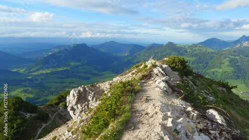 Experience Tranquil Spring Hiking in Tannheimer Tal, Tirol - Majestic Mountain Peaks, Rolling Green Hills, and Stunning Alpine Views at Oberjoch Pass in Austria