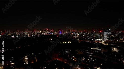 Wallpaper Mural Drone View Of London Cityscape Skyline At Night, Illuminated Buildings and Ferris Wheel In The Distance Torontodigital.ca