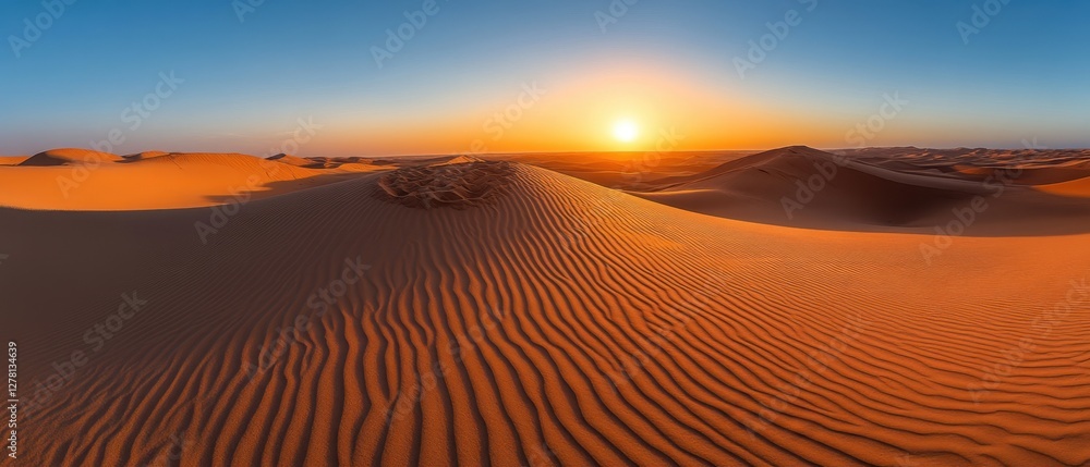 Naklejka premium Majestic desert landscape at sunset with golden sand dunes and clear blue sky creating a serene and peaceful atmosphere in a remote location