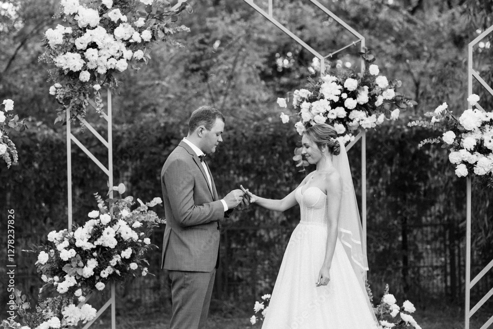 wedding ceremony of the newlyweds on the glade