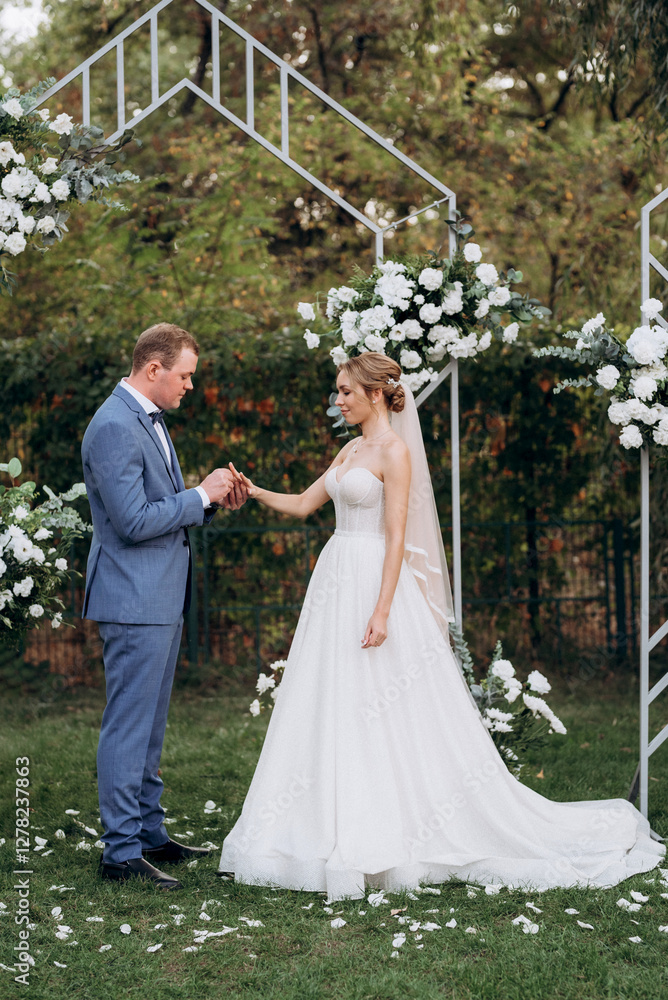 wedding ceremony of the newlyweds on the glade