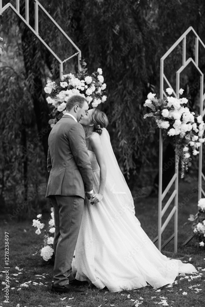 wedding ceremony of the newlyweds on the glade