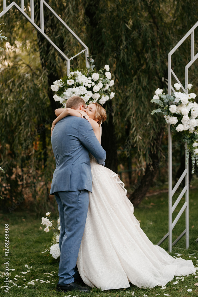 wedding ceremony of the newlyweds on the glade