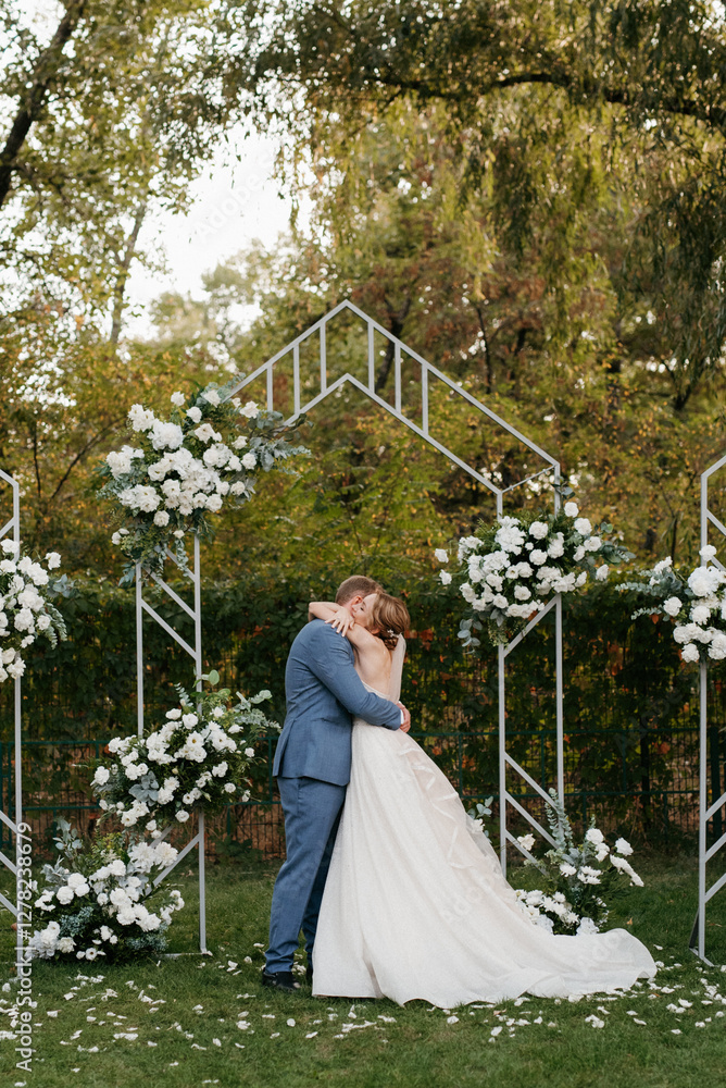 wedding ceremony of the newlyweds on the glade