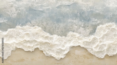 Close-up of ocean waves crashing on sandy beach.